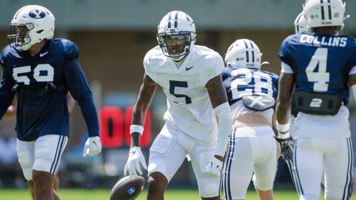 Darius Lassiter hauls in a contested catch during BYU's first scrimmage