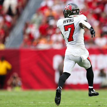 Sep 8, 2024; Tampa, Florida, USA; Tampa Bay Buccaneers running back Bucky Irving (7) runs with the ball against the Washington Commanders in the fourth quarter at Raymond James Stadium. Mandatory Credit: Nathan Ray Seebeck-Imagn Images