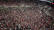 Nov 7, 2013; Stanford, CA, USA; Stanford Cardinal fans rush the field after the win against the Oregon Ducks at Stanford Stadium. The Stanford Cardinal defeated the Oregon Ducks 26-20. Mandatory Credit: Kelley L Cox-Imagn Images