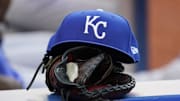 Jul 30, 2021; Toronto, Ontario, CAN; A Kansas City Royals hat and glove in the dugout during a game against the Toronto Blue Jays at Rogers Centre. Mandatory Credit: John E. Sokolowski-Imagn Images