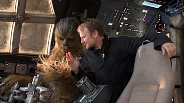 Star Wars: The Last Jedi..L to R: Chewbacca (Joonas Suotamo) and Director Rian Johnson..Photo: David James..©2017 Lucasfilm Ltd. All Rights Reserved.