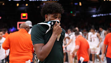 Mar 30, 2025; Atlanta, GA, USA; Michigan State Spartans guard Jase Richardson (11) leaves the court after losing the South Regional final of the 2025 NCAA tournament against the Auburn Tigers Spartans at State Farm Arena. Mandatory Credit: Brett Davis-Imagn Images