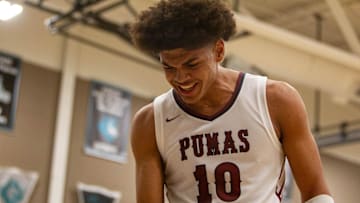 Nov 22, 2023; Chandler, AZ, USA; Koa Peat (10) celebrates his teammates score at the LV8 Invitational at Chandler-Gilbert Community College gym. Sam Ballesteros/The Republic