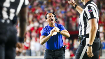 Nov 15, 2025; Oxford, Mississippi, USA; Florida Gators interim head coach Billy Gonzales calls for a timeout against the Mississippi Rebels during the second quarter at Vaught-Hemingway Stadium. Mandatory Credit: Petre Thomas-Imagn Images