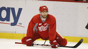 Red Wings forward Henrik Zetterberg stretches during a break in practice in Detroit on Monday, April 9, 2012.

Rw 040912 Prac Jhg29
