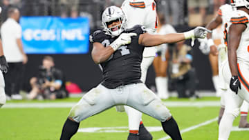 Las Vegas Raiders defensive tackle Christian Wilkins celebrates after a penalty on a scoring play by the Cleveland Browns