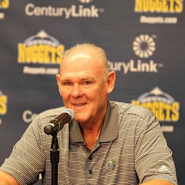 Oct 1, 2012; Denver, CO, USA; Denver Nuggets head coach George Karl is interviewed by reporters during media day at the Pepsi Center. Mandatory Credit: Troy Babbitt-Imagn Images