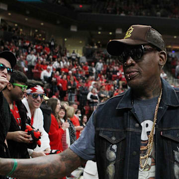 Feb 29, 2020; Lubbock, Texas, USA;  NBA Hall of Fame member Dennis Rodman greets the crowd during the game between the Texas Tech Red Raiders and the Texas Longhorns at United Supermarkets Arena. Mandatory Credit: Michael C. Johnson-Imagn Images