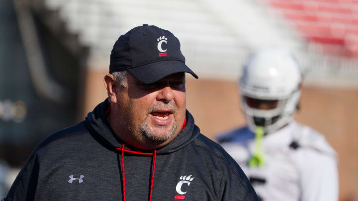 Cincinnati Bearcats offensive line coach Ron Crook speaks to the offensive line during Cincinnati Bearcats football practice Wednesday, July 31, 2019, at the University of Cincinnati.

Cincinnati Bearcats 82