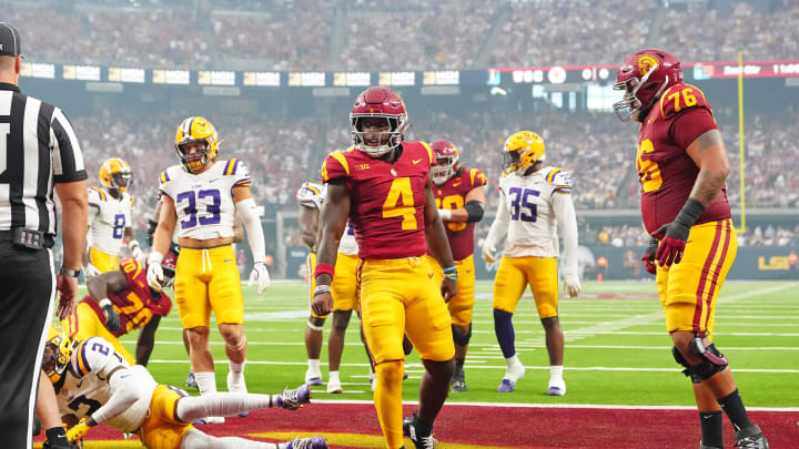 Sep 1, 2024; Paradise, Nevada, USA; Southern California Trojans running back Woody Marks (4) celebrates after scoring a touchdown against the LSU Tigers during the second quarter at Allegiant Stadium. Mandatory Credit: Stephen R. Sylvanie-USA TODAY Sports