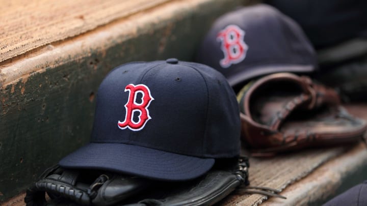 Aug 23, 2011; Arlington, TX, USA; Hats and gloves from the Boston Red Sox team near the edge of the dugout before the game against the Texas Rangers at Rangers Ballpark.  Mandatory Credit: Kevin Jairaj-USA TODAY Sports