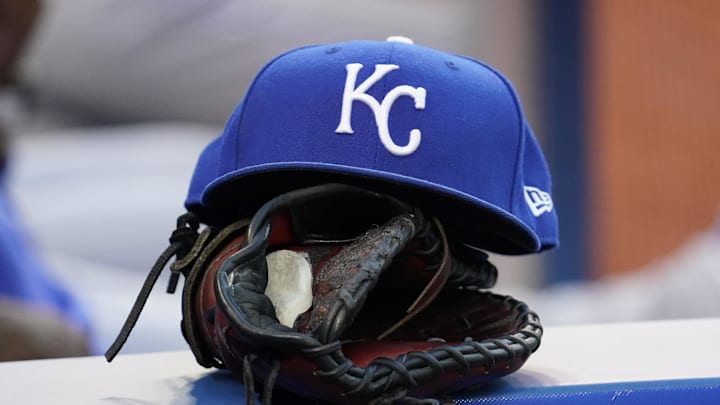 Jul 30, 2021; Toronto, Ontario, CAN; A Kansas City Royals hat and glove in the dugout during a game against the Toronto Blue Jays at Rogers Centre. Mandatory Credit: John E. Sokolowski-Imagn Images Jul 30, 2021; Toronto, Ontario, CAN; A Kansas City Royals hat and glove in the dugout during a game against the Toronto Blue Jays at Rogers Centre. Mandatory Credit: John E. Sokolowski-Imagn Images