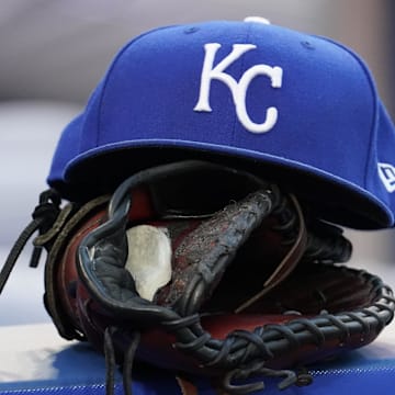 Jul 30, 2021; Toronto, Ontario, CAN; A Kansas City Royals hat and glove in the dugout during a game against the Toronto Blue Jays at Rogers Centre. Mandatory Credit: John E. Sokolowski-Imagn Images