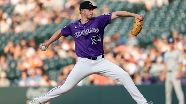Aug 4, 2025; Denver, Colorado, USA; Colorado Rockies starting pitcher Tanner Gordon (29) pitches in the first inning against the Toronto Blue Jays at Coors Field. 