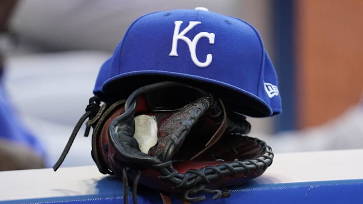 Jul 30, 2021; Toronto, Ontario, CAN; A Kansas City Royals hat and glove in the dugout during a game against the Toronto Blue Jays at Rogers Centre. Mandatory Credit: John E. Sokolowski-Imagn Images