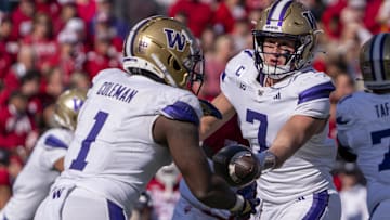 Oct 26, 2024; Bloomington, Indiana, USA; Washington Huskies quarterback Will Rogers (7) hands the ball off to Washington Huskies running back Jonah Coleman (1) during the first quarter agains the Indiana Hoosiers at Memorial Stadium. Mandatory Credit: Jacob Musselman-Imagn Images