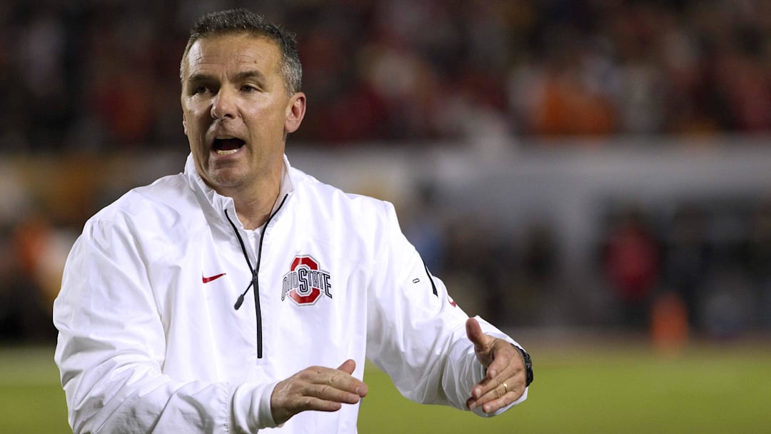 Jan 3, 2014; Miami Gardens, FL, USA; Ohio State Buckeyes head coach Urban Meyer reacts during the first half in the 2014 Orange Bowl college football game against the Clemson Tigers Jan 3, 2014; Miami Gardens, FL, USA; Ohio State Buckeyes head coach Urban Meyer reacts during the first half in the 2014 Orange Bowl college football game against the Clemson Tigers