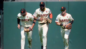 Jul 28, 2024; San Francisco, California, USA; San Francisco Giants outfielders Michael Conforto (8) (left), Derek Hill (48) (center) and Mike Yastrzemski (5) run in from the outfield.