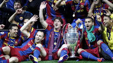 May 28, 2011; London, ENGLAND; FC Barcelona player Lionel Messi (middle) and his teammates celebrate with the championship trophy after defeating Manchester United 3-1 in the 2011 UEFA Champions League final at Wembley Stadium. Mandatory Credit: Walter Luger/GEPA via Imagn Images