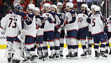 Apr 13, 2025; Washington, District of Columbia, USA; Columbus Blue Jackets goaltender Jet Greaves (73) celebrates with teammates after their game against the Washington Capitals at Capital One Arena. Mandatory Credit: Geoff Burke-Imagn Images