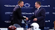 Matt Campbell, left, shakes hands with Penn State Athletic Director Pat Kraft while being announced as the Penn State Nittany Lions new head coach during a press conference at Beaver Stadium.