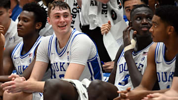 Feb 12, 2025; Durham, North Carolina, USA;Duke Blue Devils forward Cooper Flagg (2) reacts on the bench during the second half against the California Golden Bears at Cameron Indoor Stadium. Mandatory Credit: Rob Kinnan-Imagn Images