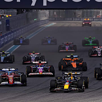 May 4, 2024; Miami Gardens, Florida, USA; Red Bull Racing driver Max Verstappen (1) leads the start of the F1 Sprint Race at Miami International Autodrome. Mandatory Credit: Peter Casey-Imagn Images