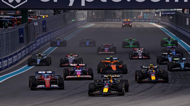 May 4, 2024; Miami Gardens, Florida, USA; Red Bull Racing driver Max Verstappen (1) leads the start of the F1 Sprint Race at Miami International Autodrome. Mandatory Credit: Peter Casey-USA TODAY Sports