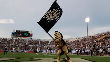 Sep 3, 2015; Orlando, FL, USA; UCF Knights mascot, Knightro, waves a flag against the FIU Golden Panthers at Bright House Networks Stadium. Mandatory Credit: Kim Klement-USA TODAY Sports