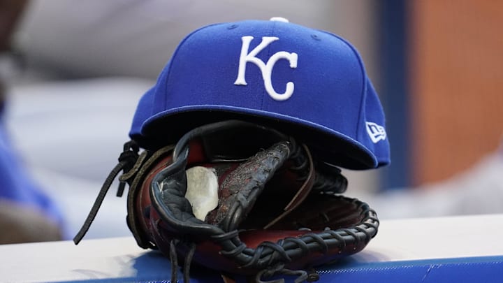 Jul 30, 2021; Toronto, Ontario, CAN; A Kansas City Royals hat and glove in the dugout during a game against the Toronto Blue Jays at Rogers Centre. Mandatory Credit: John E. Sokolowski-Imagn Images