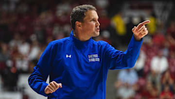 McNeese State Cowboys head coach Will Wade gives instructions to his players from the bench during the first half at Coleman Coliseum. 