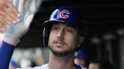Oct 2, 2025; Chicago, Illinois, USA; Chicago Cubs outfielder Kyle Tucker (30) is greeted in the dugout after scoring against the San Diego Padres during game three of the Wildcard round for the 2025 MLB playoffs at Wrigley Field.