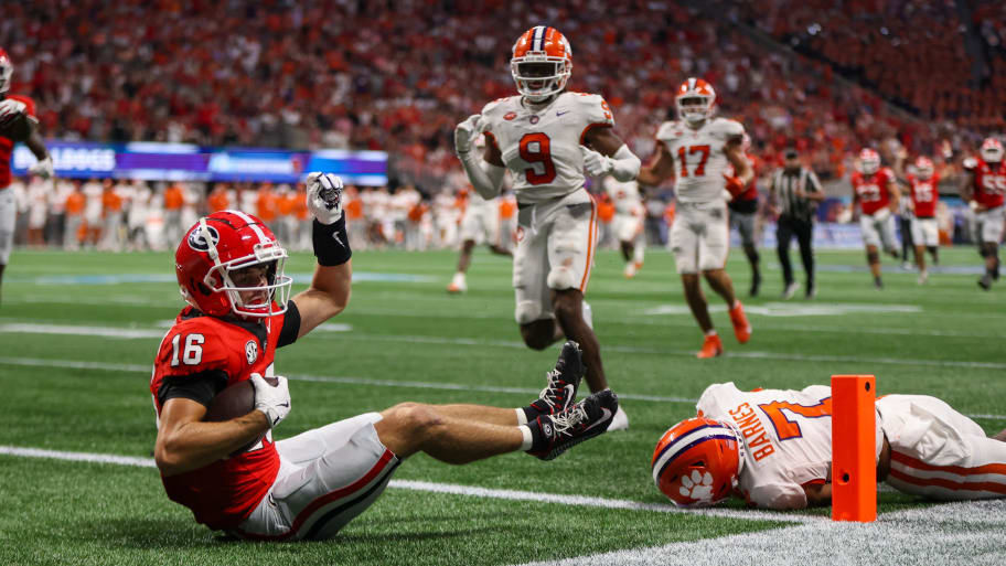 Bulldogs wide receiver London Humphreys dives into the end zone for a touchdown.