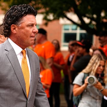 Oklahoma State head coach Mike Gundy walks during the Spirit Walk 