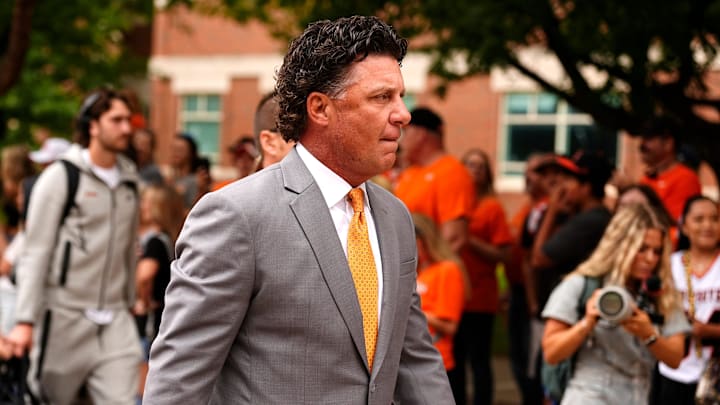 Oklahoma State head coach Mike Gundy walks during the Spirit Walk 