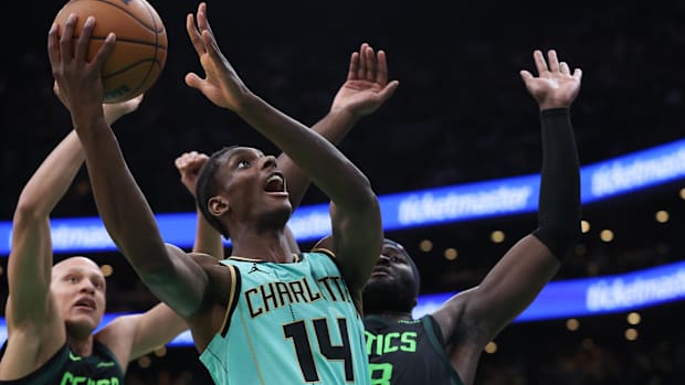 Charlotte Hornets forward Moussa Diabate (14) shoots during the second half against the Boston Celtics at TD Garden