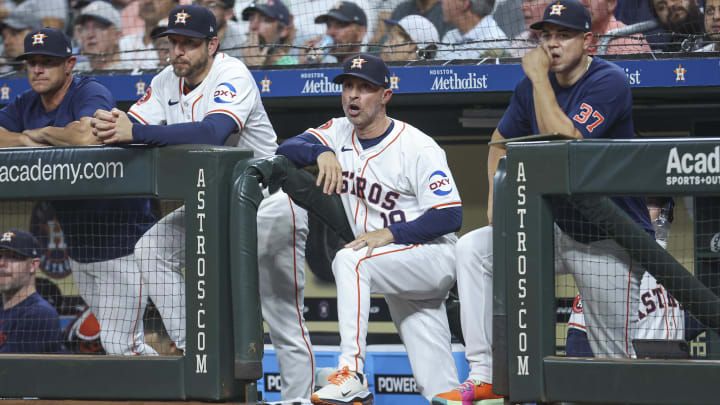 Aug 20, 2024; Houston, Texas, USA; Houston Astros manager Joe Espada (19) reacts from the dugout during the fourth inning against the Boston Red Sox at Minute Maid Park