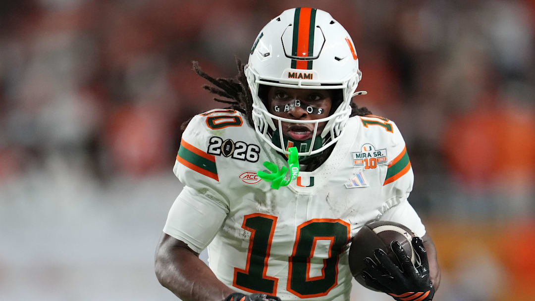 Jan 19, 2026; Miami Gardens, FL, USA; Miami Hurricanes wide receiver Malachi Toney (10) runs with the ball against the Indiana Hoosiers during the second half of the College Football Playoff National Championship game at Hard Rock Stadium. Mandatory Credit: Kirby Lee-Imagn Images