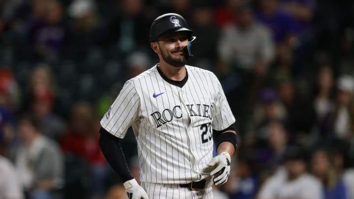 May 24, 2024; Denver, Colorado, USA; Colorado Rockies designated hitter Kris Bryant (23) reacts after a pitch in the tenth inning against the Philadelphia Phillies at Coors Field.