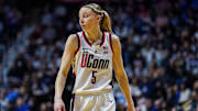 Mar 8, 2025; Uncasville, CT, USA; UConn Huskies guard Paige Bueckers (5) returns up court against the St. John's Red Storm in the first half at Mohegan Sun Arena. Mandatory Credit: David Butler II-Imagn Images
