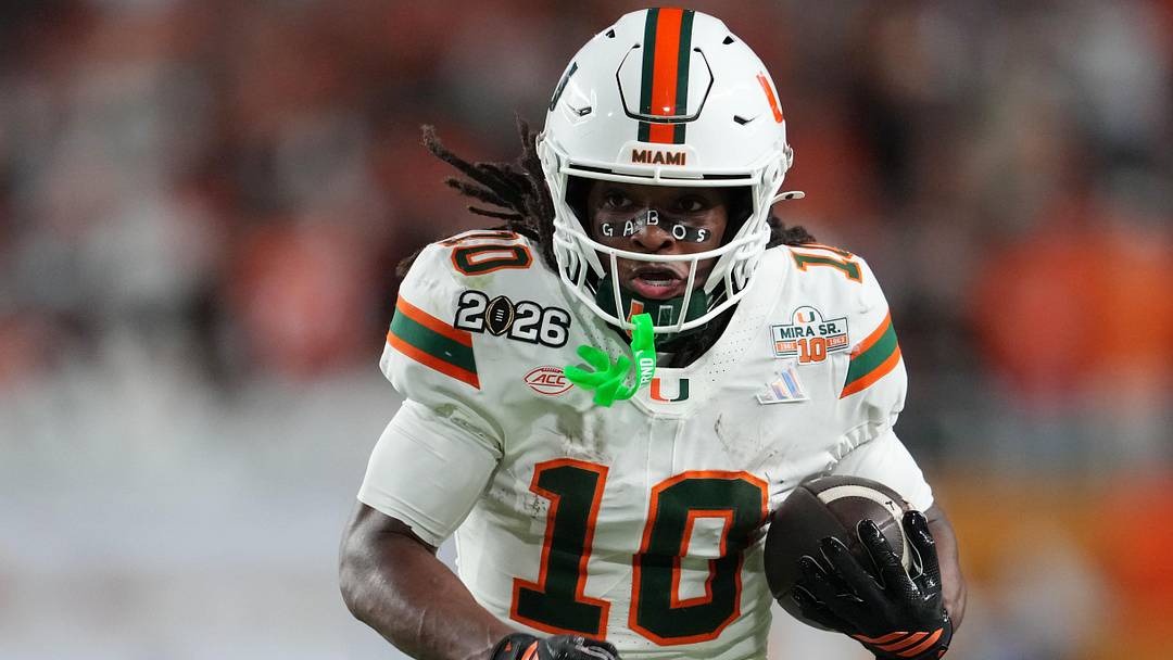 Jan 19, 2026; Miami Gardens, FL, USA; Miami Hurricanes wide receiver Malachi Toney (10) runs with the ball against the Indiana Hoosiers during the second half of the College Football Playoff National Championship game at Hard Rock Stadium. Mandatory Credit: Kirby Lee-Imagn Images