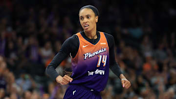 Jul 9, 2025; Phoenix, Arizona, USA; Phoenix Mercury forward DeWanna Bonner (14) against the Minnesota Lynx during the first half at PHX Arena. Mandatory Credit: Mark J. Rebilas-Imagn Images