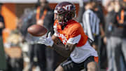 Jan 29, 2025; Mobile, AL, USA; National team wide receiver Da'Quan Felton of Virginia Tech (5) grabs a pass during Senior Bowl practice for the National team at Hancock Whitney Stadium.  