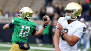 Notre Dame quarterbacks CJ Carr (12) and Kenny Minchey (8) warm up
