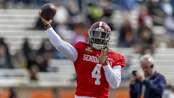 Jan 28, 2025; Mobile, AL, USA; American team quarterback Jalen Milroe of Alabama (4) throws the ball during Senior Bowl practice for the American team at Hancock Whitney Stadium. Mandatory Credit: Vasha Hunt-Imagn Images