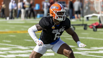 Jan 29, 2025; Mobile, AL, USA; American team linebacker Shemar James of Florida (6) works in drills during Senior Bowl practice for the National team at Hancock Whitney Stadium. Mandatory Credit: Vasha Hunt-Imagn Images