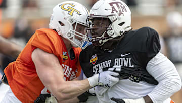Jan 28, 2025; Mobile, AL, USA; American team tight end Jackson Hawes of Georgia Tech (87) spars with American team defensive lineman Shemar Stewart of Texas A&M (14) during Senior Bowl practice for the American team at Hancock Whitney Stadium. Mandatory Credit: Vasha Hunt-Imagn Images