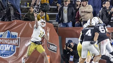 Dec 27, 2024; Birmingham, AL, USA;  Georgia Tech Yellow Jackets quarterback Haynes King (10) throws the ball against the Vanderbilt Commodores during the second half of the 2024 Birmingham Bowl at Protective Stadium. Mandatory Credit: Vasha Hunt-Imagn Images