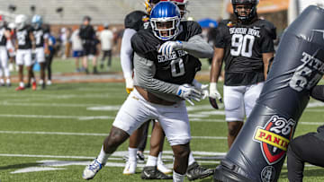 Jan 29, 2025; Mobile, AL, USA; American team defensive lineman Deone Walker of Kentucky (0) works through drills during Senior Bowl practice at Hancock Whitney Stadium. 