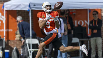 Jan 29, 2025; Mobile, AL, USA; National team wide receiver Jayden Higgins of Iowa State (9) grabs a pass during Senior Bowl practice for the National team at Hancock Whitney Stadium. Mandatory Credit: Vasha Hunt-Imagn Images